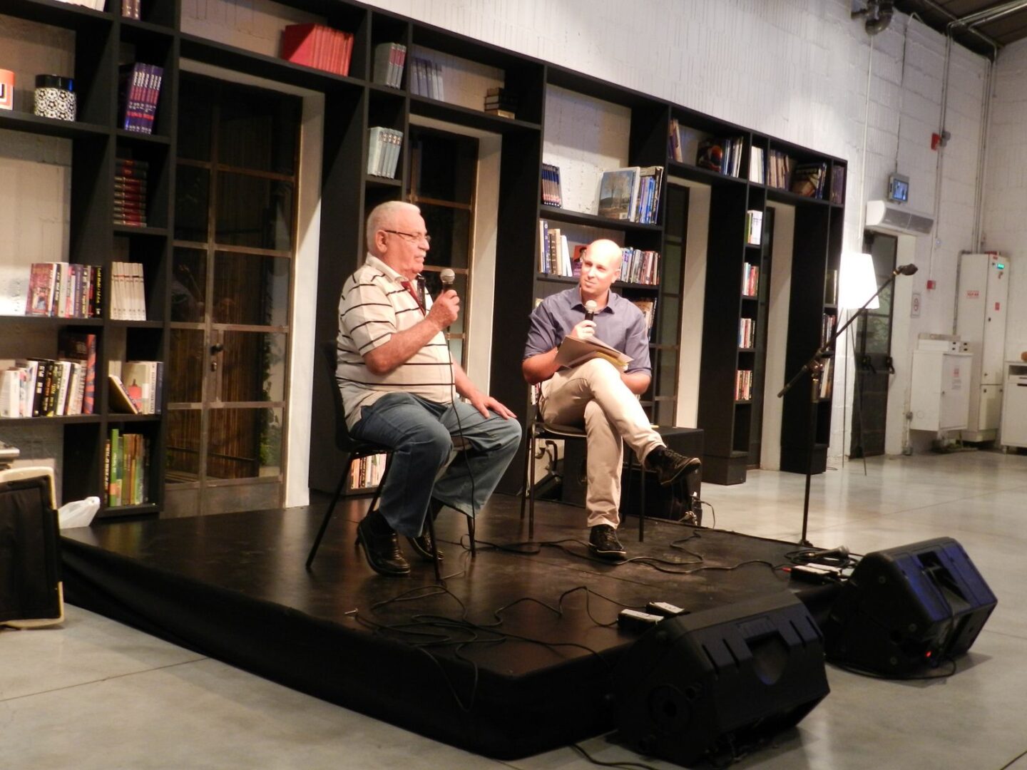 Yitzhak Livnat, a subject of the book, being interviewed by local documentary producer