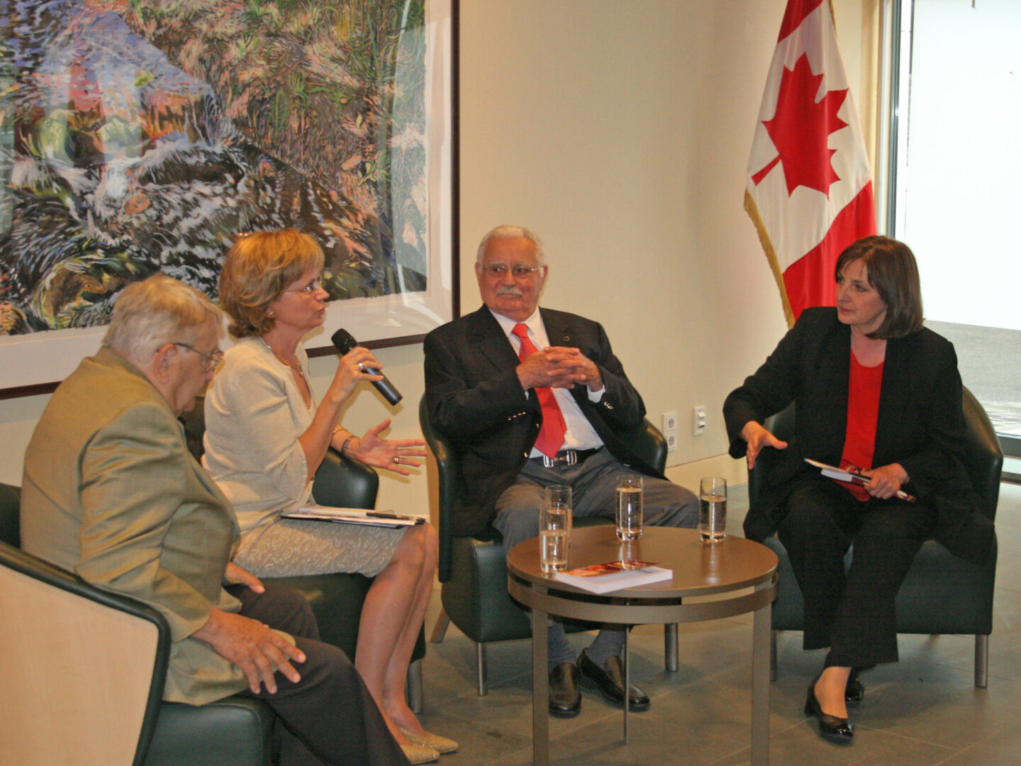 Television host Judit Endrei interviewing (L-R) Bela Aykler, Susan M. Papp and Yitzhak Livnat.